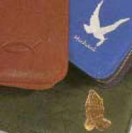 Symbolprägung auf eine Buchhülle. Fisch, Taube, Kreuz oder Betende Hände in Gold-, Silber- oder als Blindprägung (ohne Farbe)